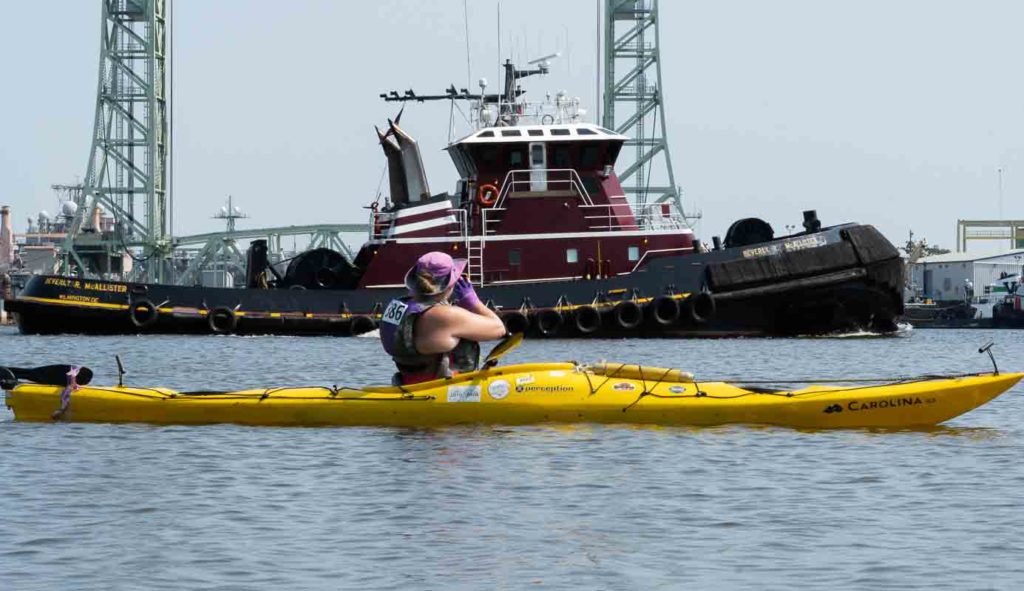 Kayak and Tugboat