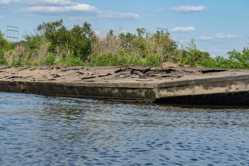 The riveted construction indicates it was built before WWII.