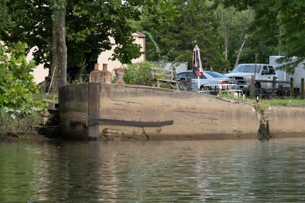 A World War One era ferrocement canal barge now serving as a bulkhead on the Neshaminy Creek. 